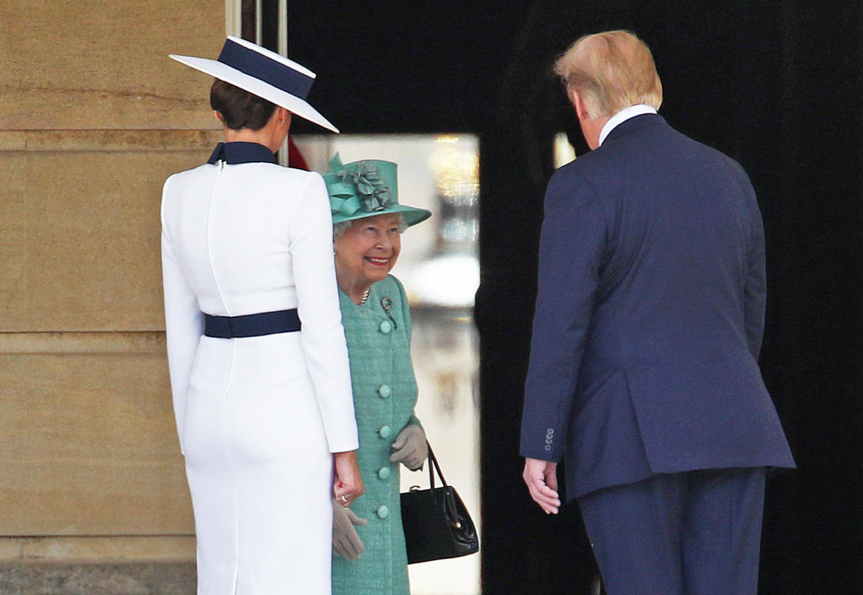 US President Donald Trump and his wife Melania are welcomed by Queen Elizabeth II during the Ceremonial Welcome at Buckingham Palace, London, on day one of his three day state visit to the UK. (Photo by Yui Mok/PA Images via Getty Images)