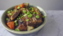 <p>Fall is, without question, stew season and we love the idea of making something that pushes the boundaries of what beef stew should look or taste like. And while we love a classic beef stew, this <a href="https://www.foodandwine.com/recipes/short-rib-stew-caramelized-kimchi" rel="nofollow noopener" target="_blank" data-ylk="slk:short rib stew with caramelized kimchi;elm:context_link;itc:0;sec:content-canvas" class="link ">short rib stew with caramelized kimchi </a>from <em>Food & Wine</em> is on another level.</p> <p>Using a slightly fattier cut of beef like short ribs lends a more luxurious feel to the stew, while the Asian influence of soy sauce, Asian pear, sesame oil and nutrient-dense kimchi contributes a wonderful sweet and savoury flavour.</p> <p>For any stew, the recommended cookware is a Dutch oven, which you can use to sear your meat before transferring to the oven to slow cook. The <a href="https://www.canadiantire.ca/en/pdp/paderno-dutch-oven-red-6-5-qt-1423479p.html?utm_source=vrz&utm_medium=display&utm_campaign=10009368_21_CTS_JNJ_FALL&utm_content=10009368_21_CTS_JNJ_FALL_EN_VRZ_CONS_TR_CAN_UTM_1x1_Kitchen%20Cookware" rel="nofollow noopener" target="_blank" data-ylk="slk:Paderno Dutch Oven, 6.5-qt;elm:context_link;itc:0;sec:content-canvas" class="link ">Paderno Dutch Oven, 6.5-qt</a> is an ideal size for those cooking for a family of four.</p> 