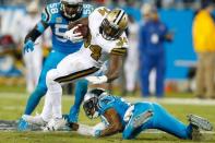 Nov 17, 2016; Charlotte, NC, USA; New Orleans Saints running back Tim Hightower (34) runs the ball during the fourth quarter against the Carolina Panthers at Bank of America Stadium. The Panthers defeated the Saints 23-20. Mandatory Credit: Jeremy Brevard-USA TODAY Sports