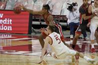 Wisconsin's Tyler Wahl and Ohio State's Eugene Brown III go after a loose ball during the second half of an NCAA college basketball game Saturday, Jan. 23, 2021, in Madison, Wis. (AP Photo/Morry Gash)