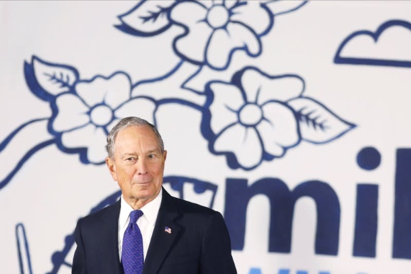 Democratic U.S. presidential candidate Mike Bloomberg prepares to leave the stage after speaking at an organizing event in Atlanta