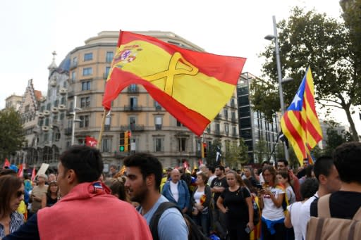 Pro-independence supporters, including Torra, have adopted a yellow ribbon to protest the arrest and jailing of the Catalan separatist leaders over the 2017 independence bid