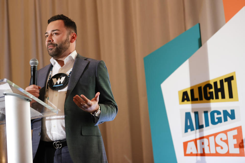 Founder and CEO of the Decolonizing Wealth Project, Edgar Villanueva, speaks during the Alight Align Arise conference on Wednesday, June 7, 2023, in Atlanta. Villanueva announced on Friday that the Decolonizing Wealth Project is committing $20 million over five years to boost campaigns run by nonprofits across the country for reparations along with a research collaboration with Boston University to map reparation projects. (AP Photo/Alex Slitz)