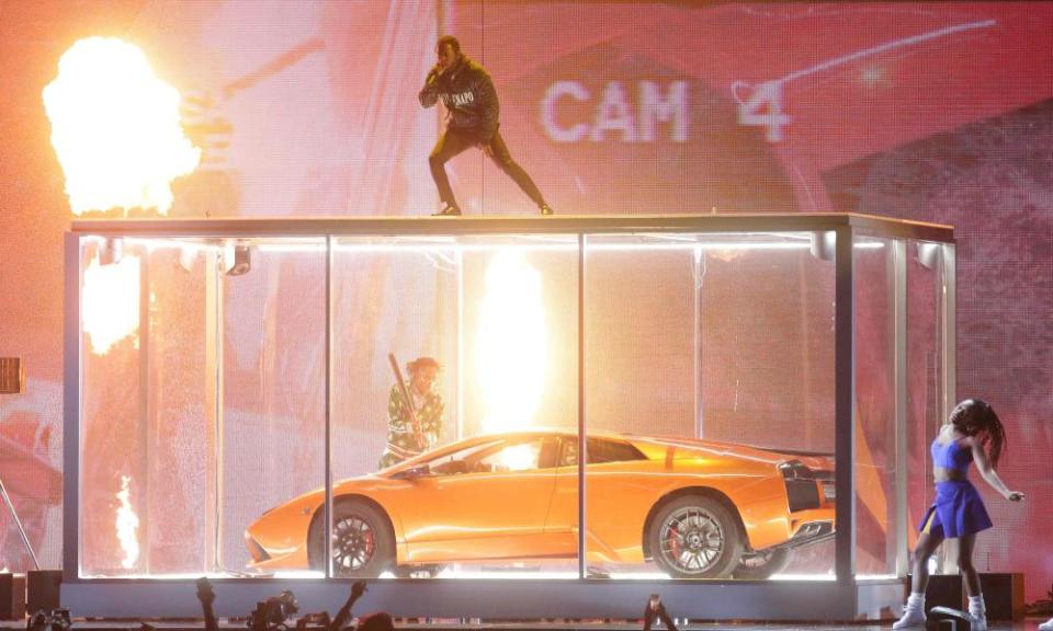 Another satire … Kendrick Lamar, top, performing at the Brits.