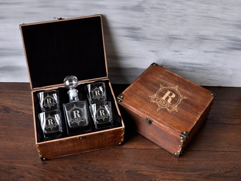 Choose from a wide variety of monogram and design styles, with the option of two to six glasses and matching wooden box. <a href="https://fave.co/2tZ6HLo" target="_blank" rel="noopener noreferrer">Find it starting at $50 on Etsy</a>.