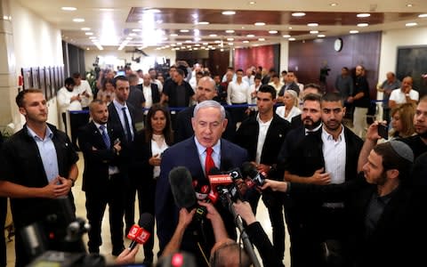 Israeli Prime Minister Benjamin Netanyahu speaks to the media at the Knesset, Israel's parliament, in Jerusalem - Credit: Reuters