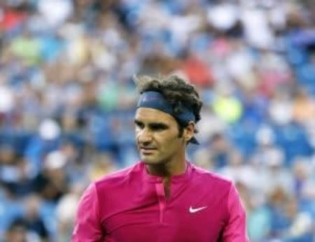 Aug 18, 2015; Cincinnati, OH, USA; Roger Federer (SUI) looks on during a stop in play against Roberto Bautista Agut (not pictured) on day four during the Western and Southern Open tennis tournament at Linder Family Tennis Center. Mandatory Credit: Aaron Doster-USA TODAY Sports