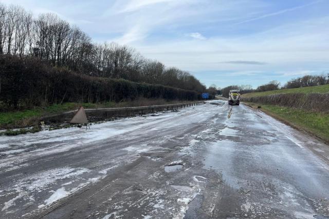 Half of road cleared of water as major route remains closed 19 days on