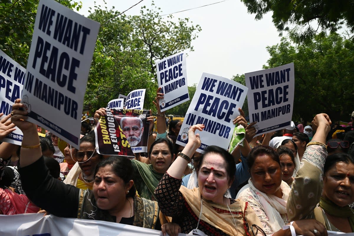 Video of the incident has been met with protests, calling for an end to violence in northeast India  (AFP via Getty Images)