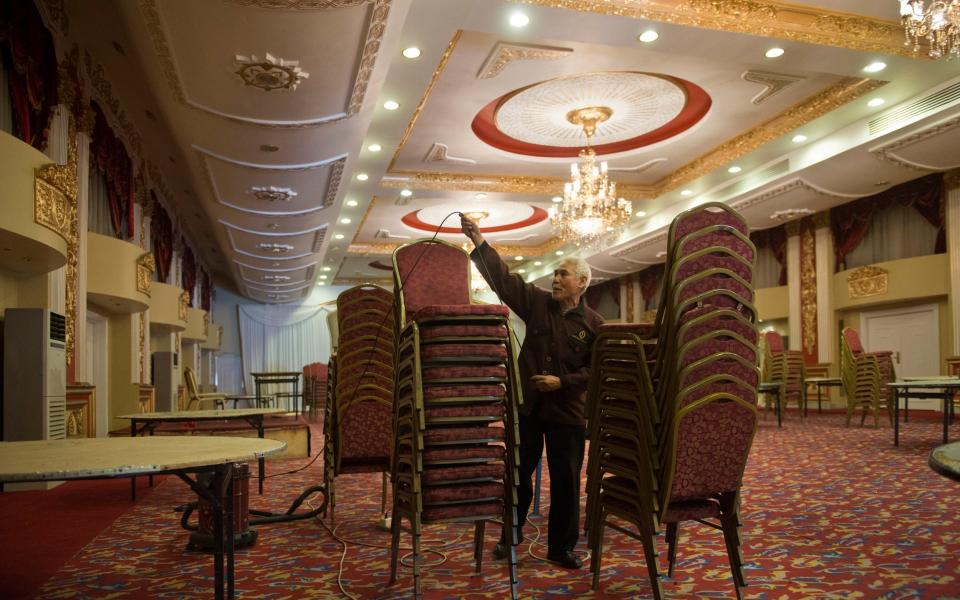 Hotel Intercontinental staff stack chairs - CAMERA PRESS 