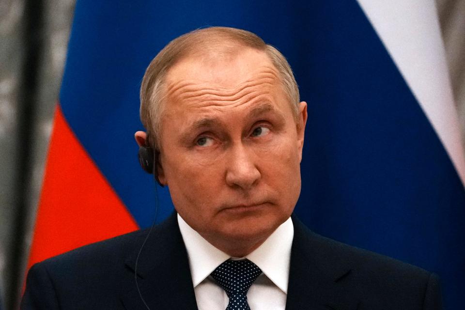 Russian President Vladimir Putin, photographed at a news conference with French President Emmanuel Macron after talks in Moscow on Feb. 7,  is known as a master of manipulation.