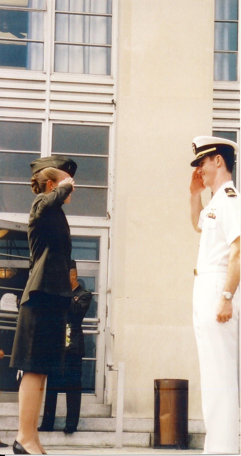 Claire Russo in 2004 at Quantico, right after being commissioned, saluting her cousin Tom Winkle, a Navy lieutenant and pilot.   Russo lived with Winkle in San Diego, and was with him the night of her assault, at the Marine Corps Ball.   It was Winkle that reported Russo's assault; she did not want to report, being afraid for her career. 