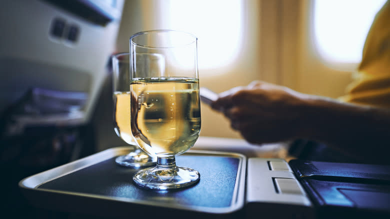 Glasses on flight trays