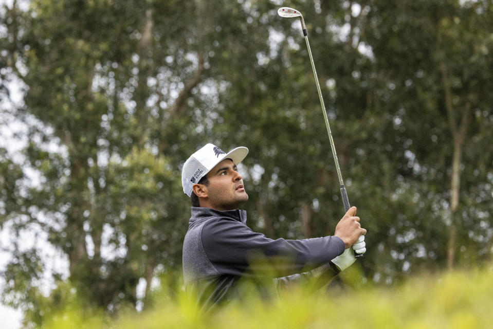 Eugenio Chacarra of Fireballs GC hits his shot from the second tee during the second round of LIV Golf Hong Kong at the Hong Kong Golf Club in Hong Kong, on Saturday, March 9, 2024. (Chris Trotman/LIV Golf via AP)