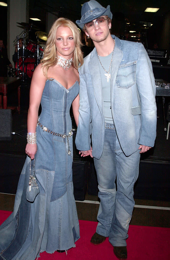 Britney Spears and Justin Timberlake wearing matching denim looks to the 28th annual American Music Awards in 2001.