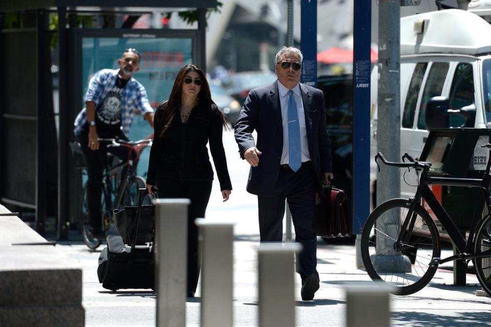 Amber Heard’s lawyer Samantha Spector (left) arrives for a court appearance on 9 August 2016 in Los Angeles (Kevork Djansezian/Getty Images)