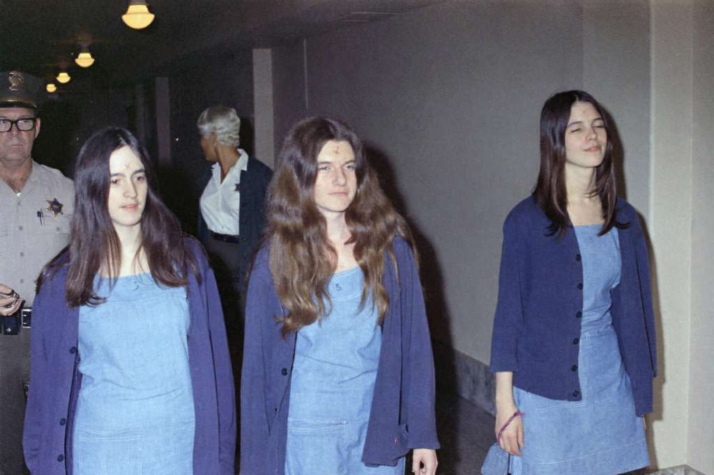 In this file photo taken Aug. 20, 1970, Charles Manson follower Patricia Krenwinkel, center, is seen walking to court with Susan Atkins, left, and Leslie Van Houten, to appear for her role in the 1969 cult killings of seven people in Los Angeles.