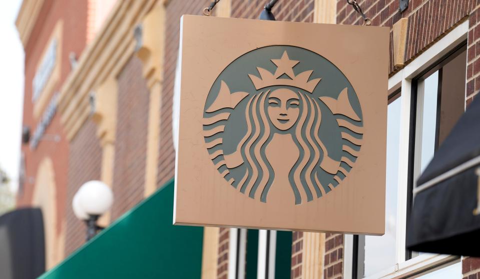 Starbucks sign hangs outside a casino along Main Street Wednesday, Sept. 20, 2023, in Deadwood, S.D.
