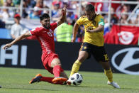 <p>Belgium’s Eden Hazard, right, and Tunisia’s Ferjani Sassi challenge for the ball. </p>