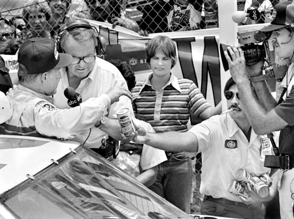 nascar driver cale yarborough in victory lane