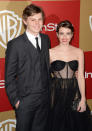 Evan Peters and Emma Roberts attend the 14th Annual Warner Bros. And InStyle Golden Globe Awards After Party held at the Oasis Courtyard at the Beverly Hilton Hotel on January 13, 2013 in Beverly Hills, California.
