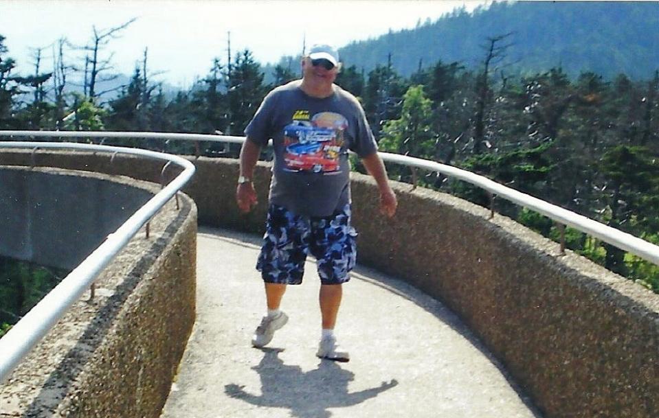 DeWitt Powell descends the walkway from the observation tower at Clingmans Dome, the highest point in Great Smoky Mountains National Park in Tennessee.