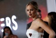 Cast member Jennifer Lawrence poses at the premiere of "Passengers" in Los Angeles, California U.S. on December 14, 2016. REUTERS/Mario Anzuoni/Files