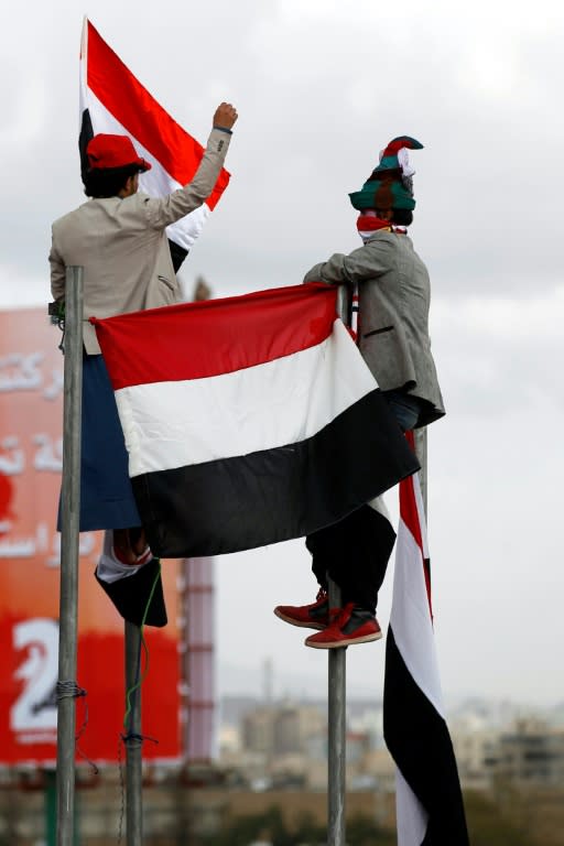 Supporters of Yemen's rebel Huthis and ex-president Ali Abdullah Saleh mark two years since the military intervention by the Saudi-led coalition, in Sanaa on March 26, 2017