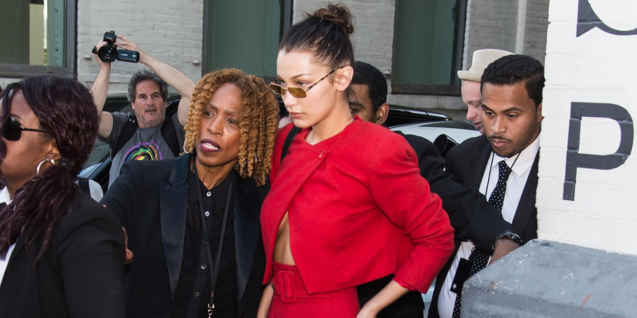 Bella Hadid told off her security guard outside the Michael Kors show. 