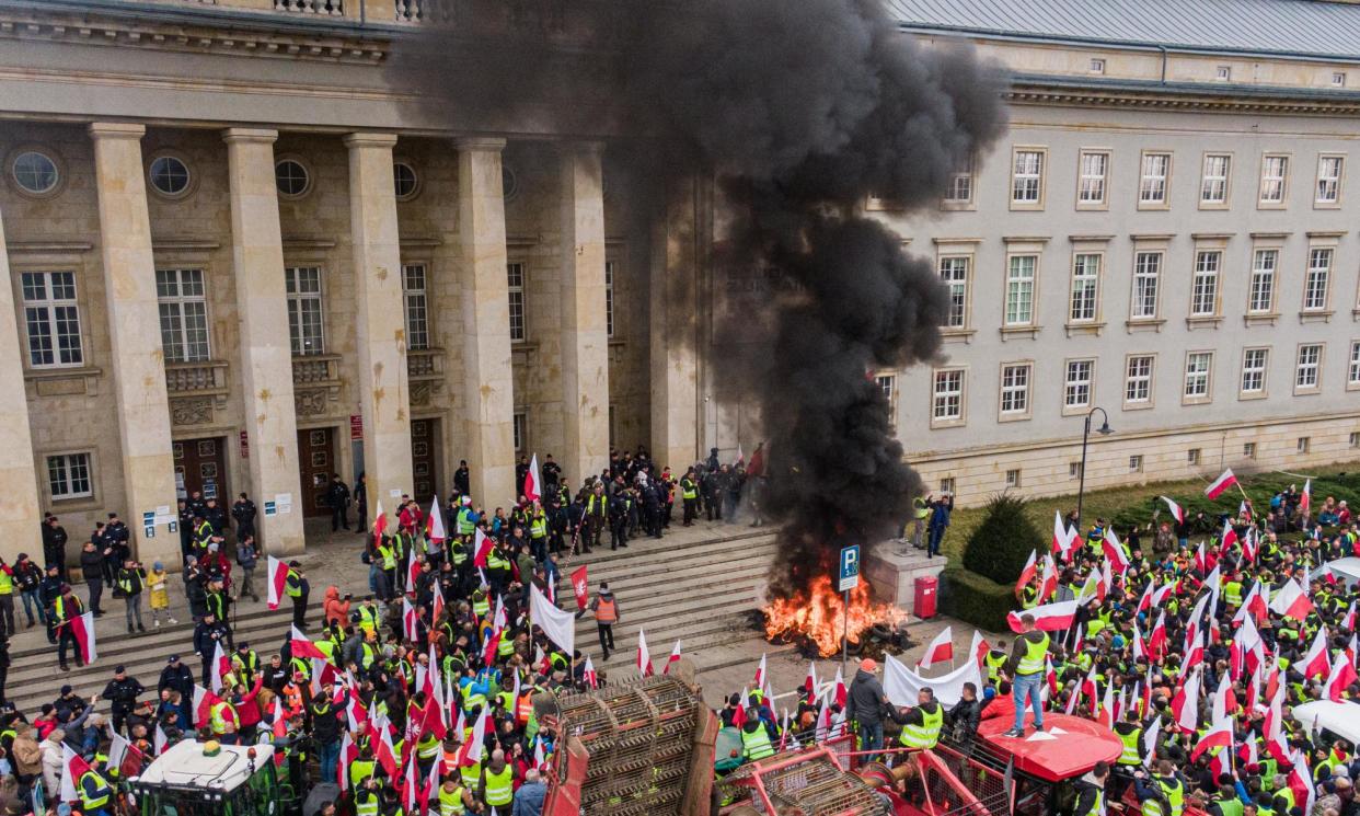 <span>Polish farmers taking part in a protest against the EU green deal and the import of Ukrainian grain in Wrocław in February.</span><span>Photograph: Anadolu/Getty Images</span>