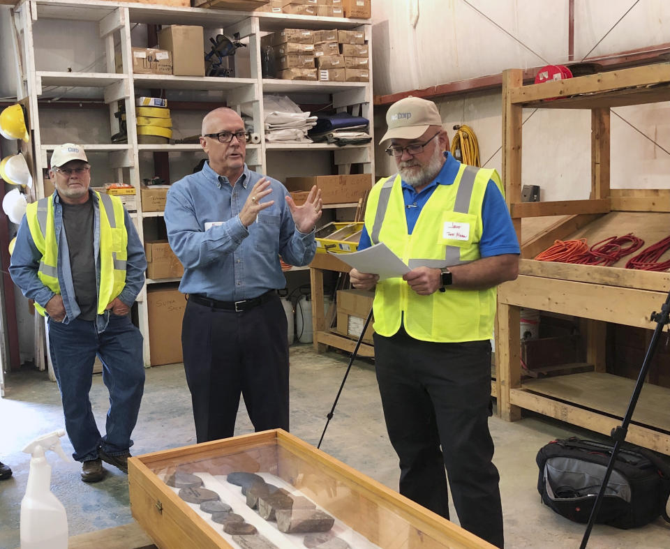 FILE -NioCorp Developments CEO Mark Smith talks to a group of investors during a tour on Oct. 6, 2021, about the prospects for a proposed mine the company hopes to build near Elk Creek in southeast Nebraska. The company that wants to build a mine in southeast Nebraska has signed a deal with a major automaker to sell the rare earth elements it hopes to produce to help Stellantis make more electric vehicles. NioCorp announced the tentative deal Thursday, July 6, 2023. (AP Photo/Josh Funk, File)