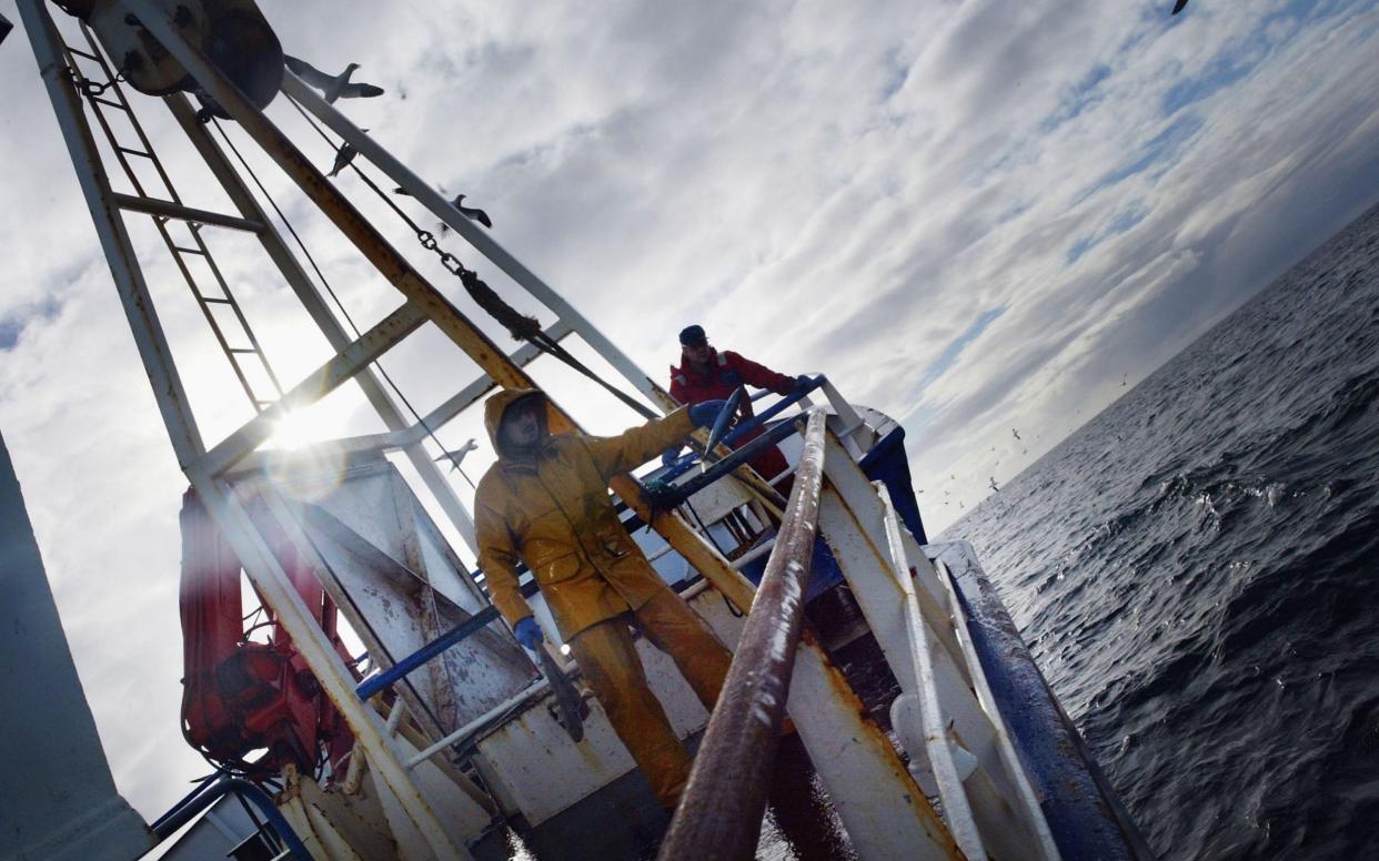 Scottish Trawlermen Work The Waters Of The North Atlantic...NORTH ATLANTIC OCEAN - MARCH 3: Scottish trawlermen on board the trawler Carina haul in their catch, March 3, 2004, some 70 miles in The Atlantic off the north coast of Scotland. Fishing boats operating out of the UK are constantly fighting to stay solvent as increasingly draconian quotas combined with declining stocks make earning their livliehood more difficult -  Christopher Furlong/Getty Images