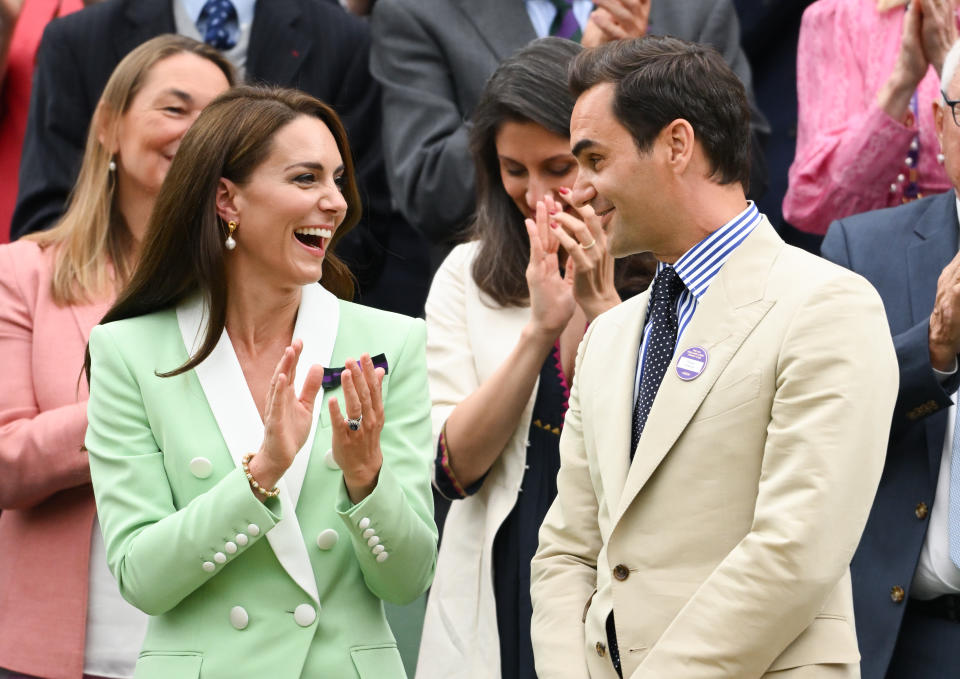 Kate Middleton and Roger Federer share a laugh.