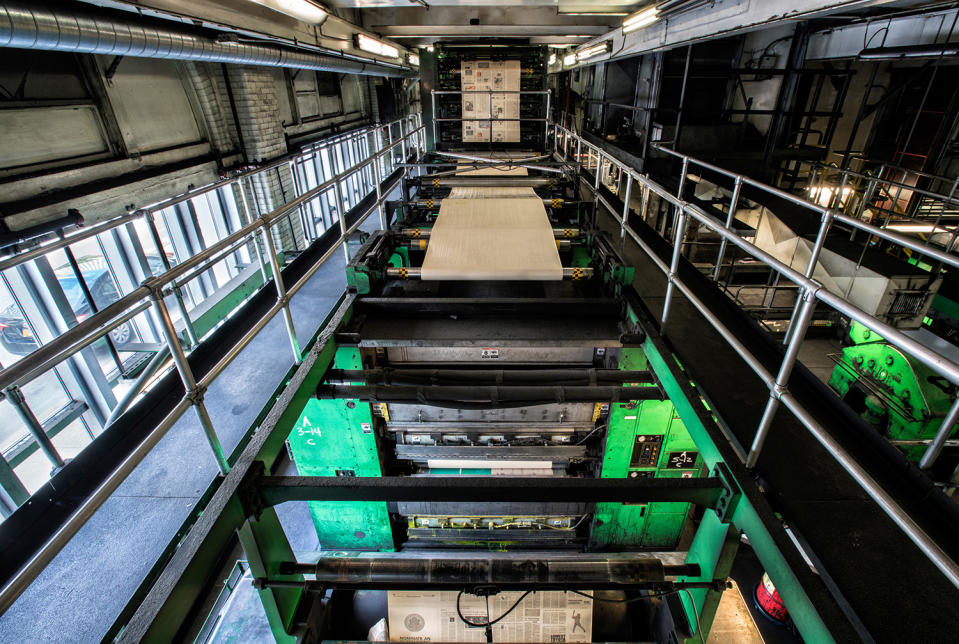 Stop the presses! Photographer documents newspaper’s eerie abandoned printing presses.