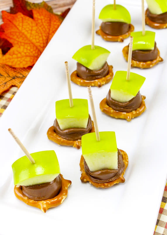 <p>Brite and Bubbly</p><p>These mini caramel apple bites will give you your candy apple fix without having to eat a whole candy apple!</p><p><strong>Get the recipe: <a href="https://briteandbubbly.com/mini-caramel-apple-bites/" rel="nofollow noopener" target="_blank" data-ylk="slk:Mini Caramel Apple Bites;elm:context_link;itc:0;sec:content-canvas" class="link ">Mini Caramel Apple Bites</a></strong></p>