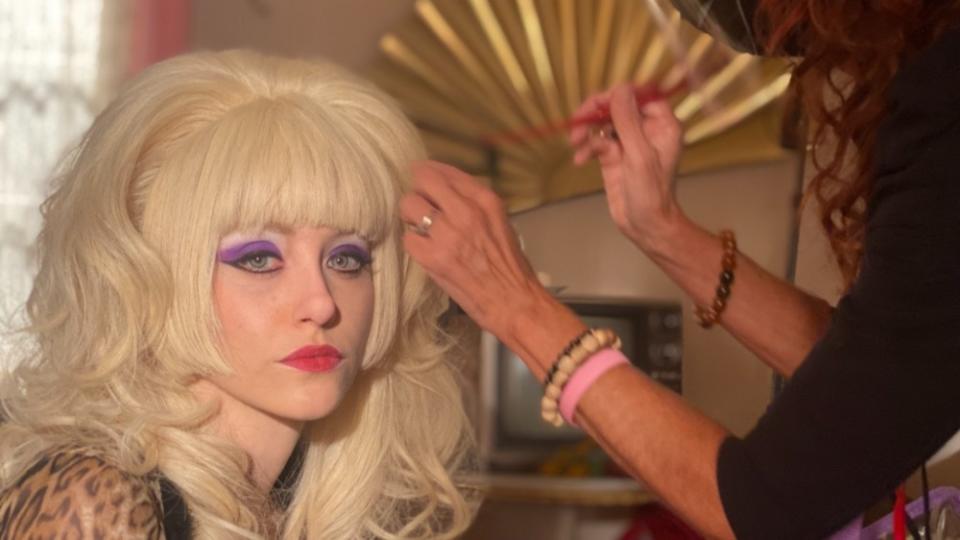 Emmy Rossum has her hair touched up on set of “Angelyne.” - Credit: Courtesy of Peacock