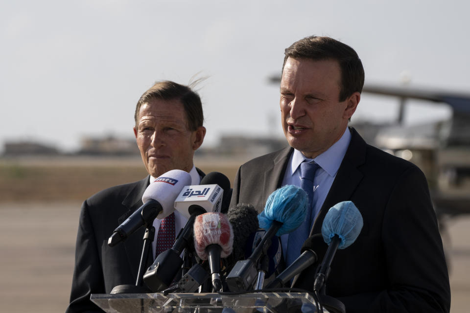 Sen. Chris Murphy, D-C.T., right, and Sen. Richard Blumenthal, D-C.T., give a press conference at the military airbase in Beirut airport, Lebanon, Wednesday, Sept. 1, 2021. A delegation of four U.S. senators visiting Lebanon promised to work on easing Lebanon's crippling economic crisis. (AP Photo/ Hassan Ammar)