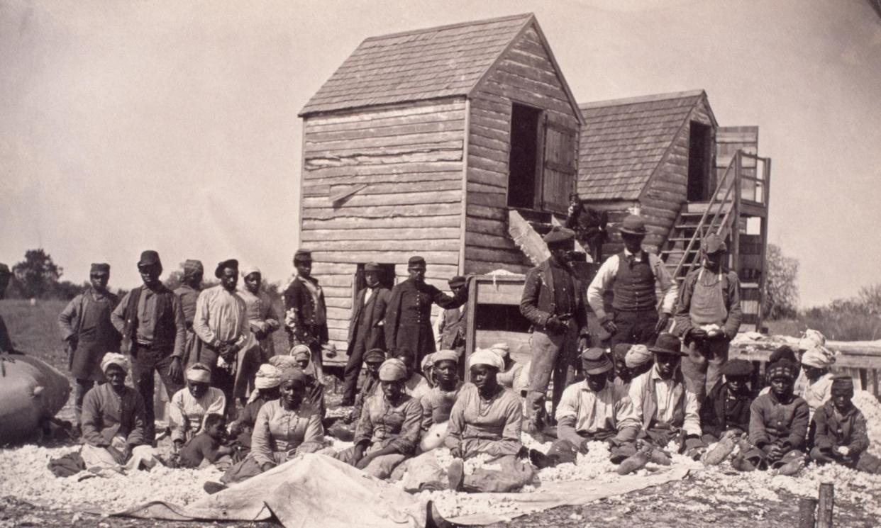 <span>A group of people who escaped slavery during the civil war on the former plantation of Thomas Drayton, a Confederate general.</span><span>Photograph: Historical/Corbis/Getty Images</span>