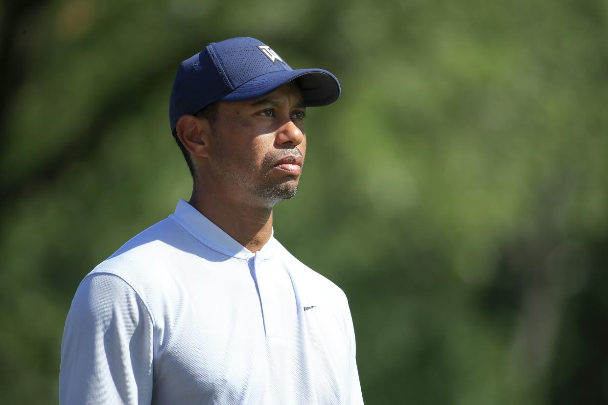 In this file photo, Tiger Woods looks on from the seventh tee during the second round of the BMW Championship on August 28, 2020 in Olympia Fields, Illinois. 