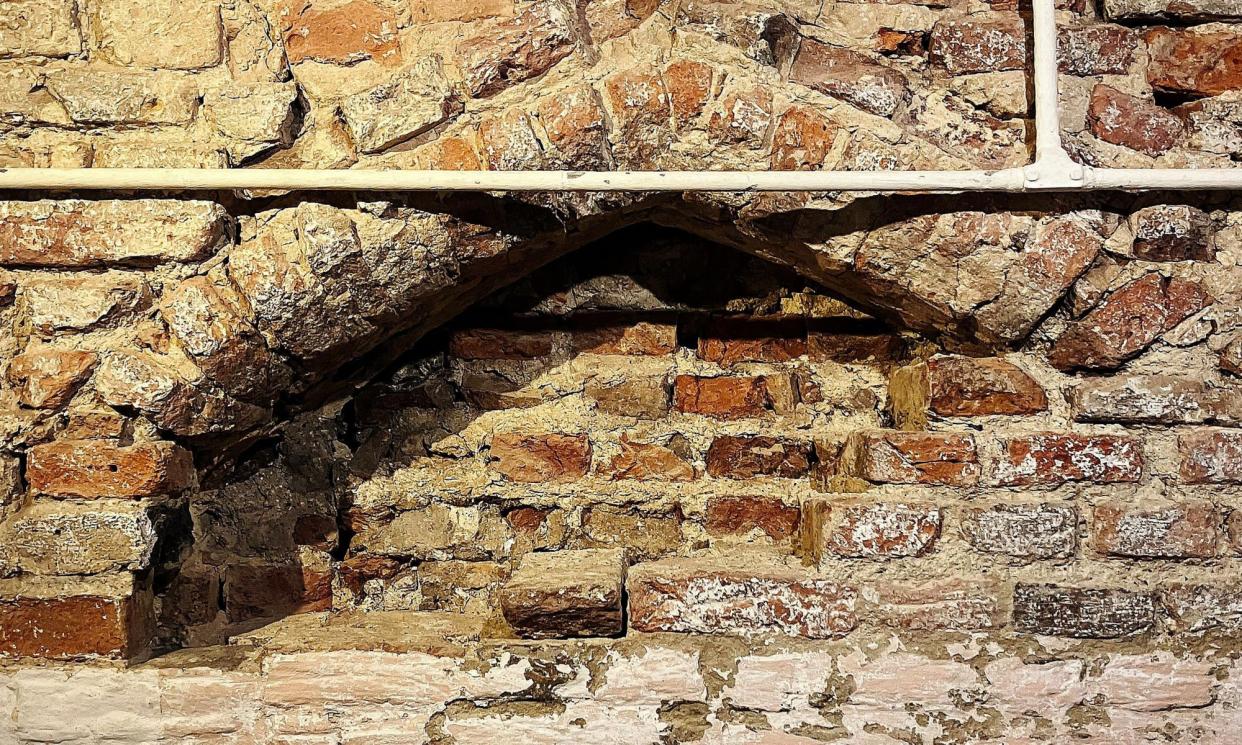 <span>The top of the 15th century archway uncovered behind a wall in St George's Guildhall, King's Lynn.</span><span>Photograph: St George’s Guildhall/PA</span>