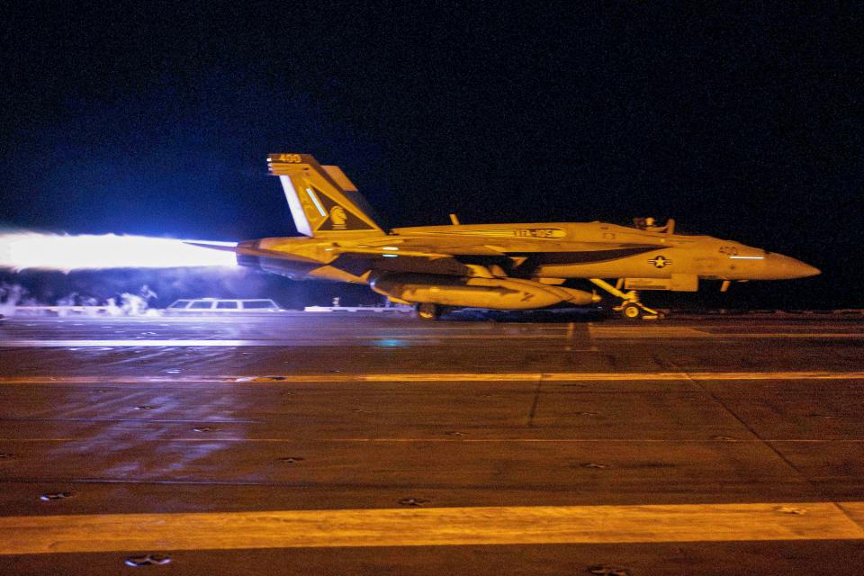 This handout picture taken on January 12, 2024 shows a fighter jet taking off from USS Dwight D. Eisenhower (CVN 69) during flight operations in response to increased Iranian-backed Houthi attacks on ships in the Red Sea (US NAVY/AFP via Getty Images)