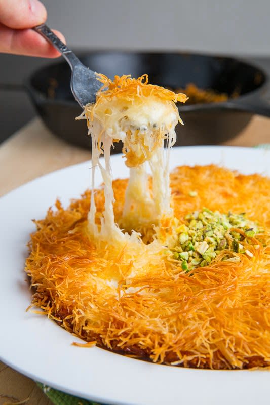 <p>Closet Cooking</p><p>A pastry consisting of hot cheese in between layers crispy shredded phyllo dough in a sweet syrup that is common in Greece, Turkey, Israel and many other countries in the area.</p><p><strong>Get the recipe: <a href="https://www.closetcooking.com/kanafeh-sweet-cheese-pastry/" rel="nofollow noopener" target="_blank" data-ylk="slk:Kanafeh (Sweet Cheese Pastry);elm:context_link;itc:0;sec:content-canvas" class="link ">Kanafeh (Sweet Cheese Pastry)</a></strong></p>