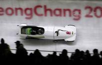 Bobsleigh - Pyeongchang 2018 Winter Olympics - Women's Competition - Olympic Sliding Centre - Pyeongchang, South Korea - February 20, 2018 - Jazmine Fenlator-Victorian and Carrie Russell of Jamaica in action. REUTERS/Arnd Wiegmann