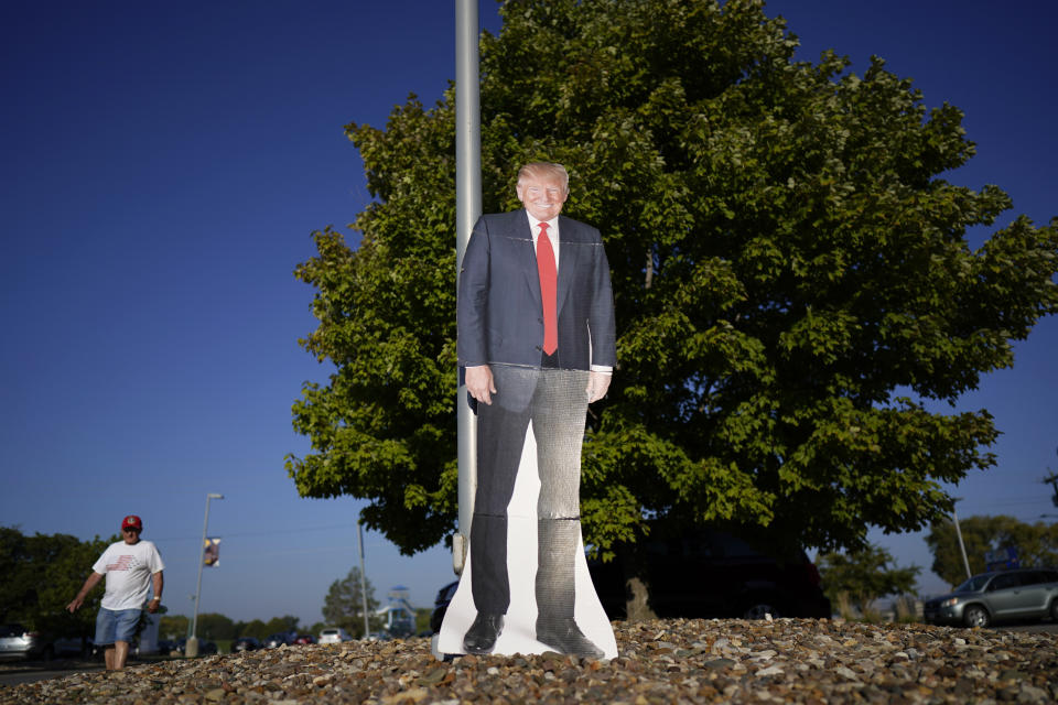 A cutout of former President Donald Trump is seen before his arrival at a rally, Sunday, Oct. 1, 2023, in Ottumwa, Iowa. (AP Photo/Charlie Neibergall)