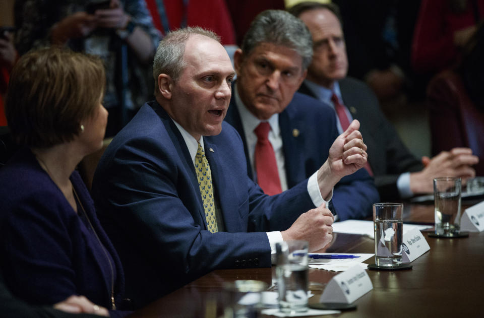 From left, Sen. Amy Klobuchar, D-Minn., Rep. Steve Scalise, R-La., Sen. Joe Manchin, D-W.V., and Sen. Pat Toomey, R-Pa.