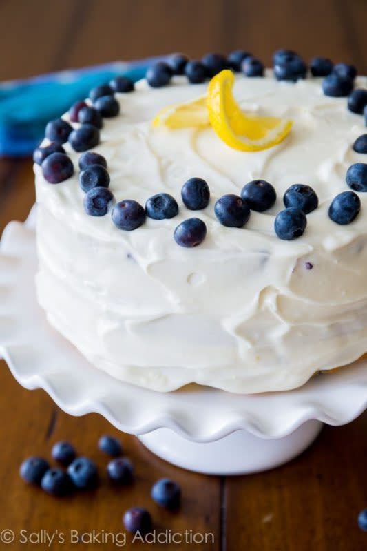 <p>Sally's Baking Addiction</p><p>Sunshine-sweet lemon blueberry layer cake dotted with juicy berries and topped with lush cream cheese frosting. One of the most popular cake recipes on this website!</p><p><strong>Get the recipe: <a href="https://sallysbakingaddiction.com/lemon-blueberry-layer-cake/" rel="nofollow noopener" target="_blank" data-ylk="slk:Lemon Blueberry Layer Cake;elm:context_link;itc:0;sec:content-canvas" class="link rapid-noclick-resp">Lemon Blueberry Layer Cake</a></strong></p>