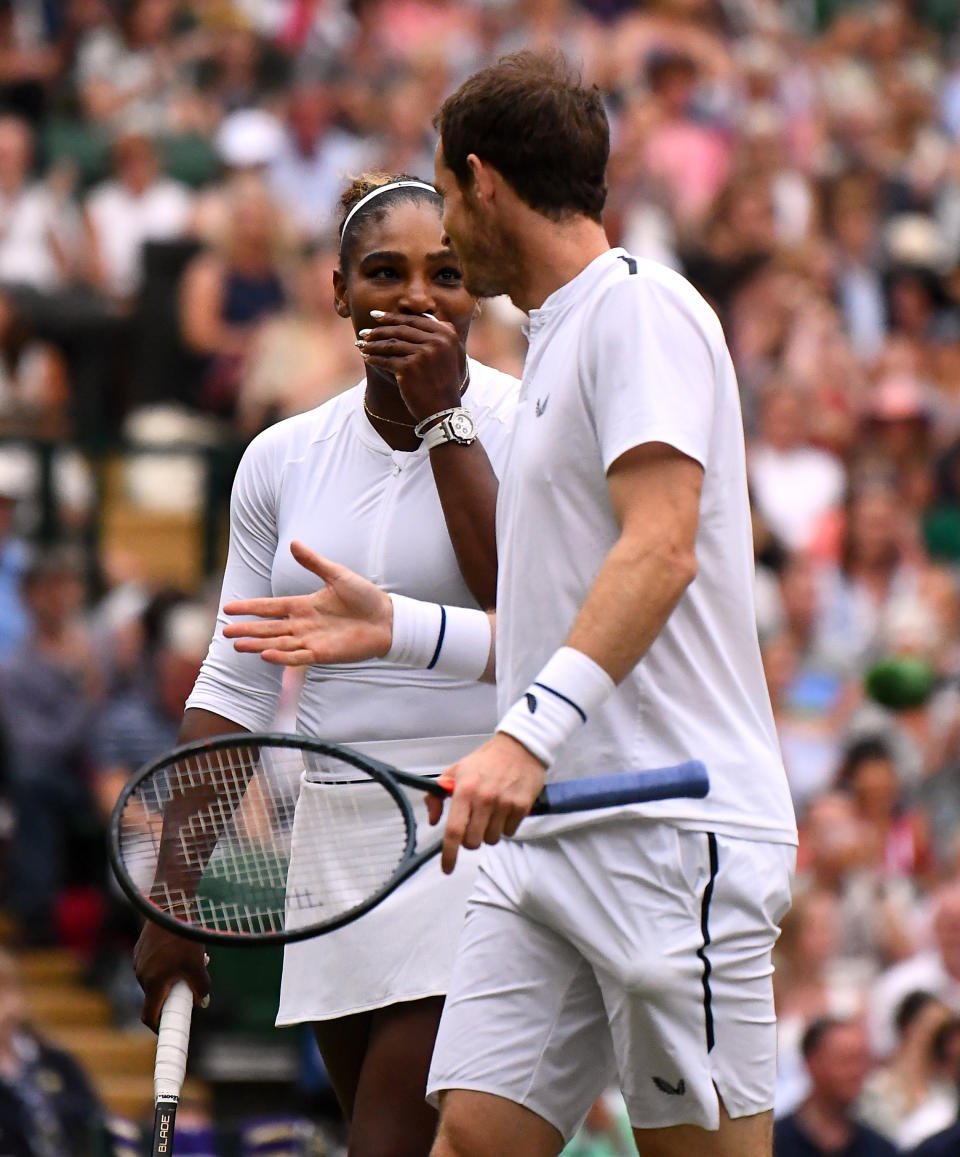 Serena Williams and Andy Murray during their mixed doubles match on day eight of the Wimbledon Championships at the All England Lawn Tennis and Croquet Club, Wimbledon.