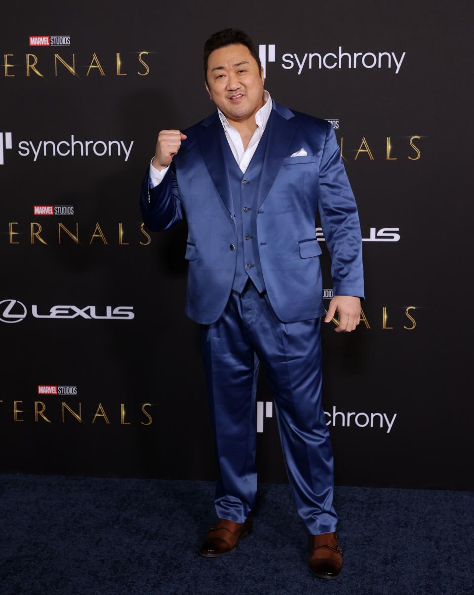 Don Lee in a blue suit