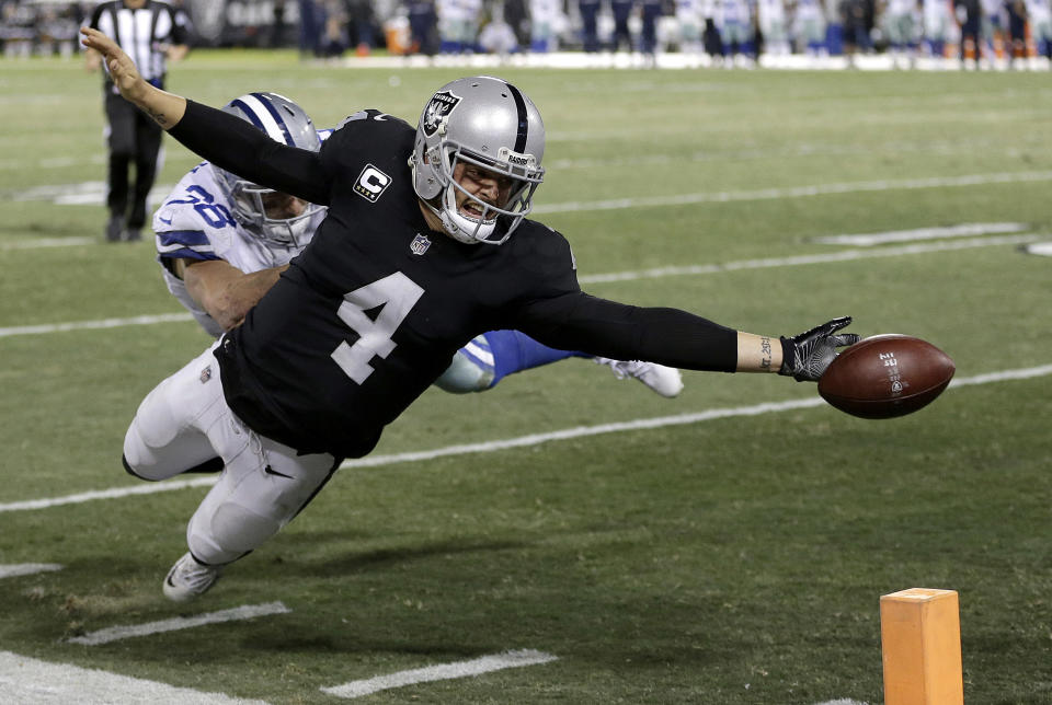 Derek Carr's fumble at the end zone against the Cowboys summed up a disappointing season for the Raiders. (AP)