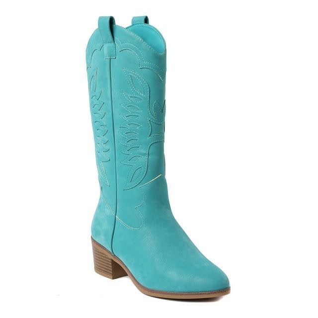 <p><a href="https://go.redirectingat.com?id=74968X1596630&url=https%3A%2F%2Fwww.walmart.com%2Fip%2FThe-Pioneer-Woman-Women-s-Eagle-Stitched-Western-Boot%2F5264213868&sref=https%3A%2F%2F" rel="nofollow noopener" target="_blank" data-ylk="slk:Shop Now;elm:context_link;itc:0;sec:content-canvas" class="link ">Shop Now</a></p><p>The Pioneer Woman Women’s Eagle-Stitched Western Boot - Teal</p><p>$48.00</p>